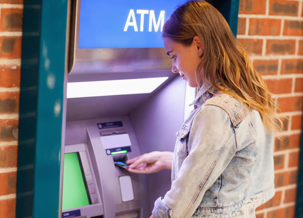 girl-using-atm